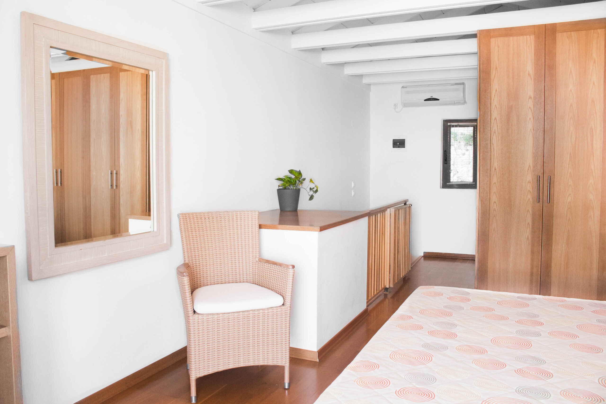 Comfortable Apartment Bedroom of Pelagos Holidays Apartments